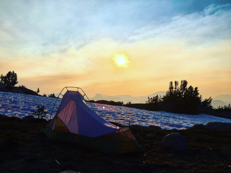 In 2017, as wildfires burned in the southern part of Yosemite, Gabriel Michael pitched his tent above Evelyn Lake, near the Vogelsang High Sierra Camp, and watched the distant smoke and haze transform the sky.